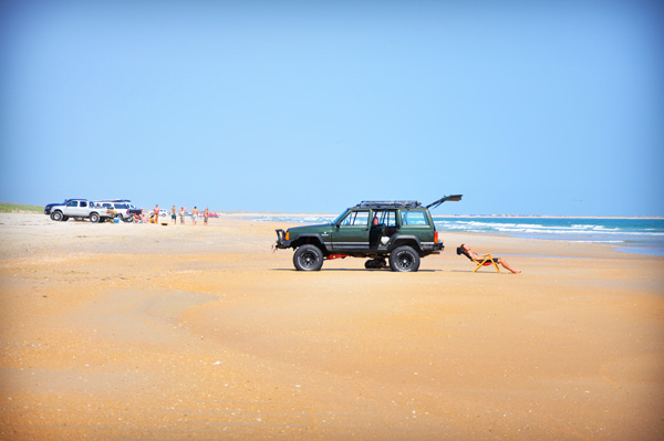 With a permit, you can still take a 4-wheel-drive vehicle onto certain beaches on the Outer Banks to fish or just enjoy the sun. Photo Courtesy Outer Banks Visitors Bureau